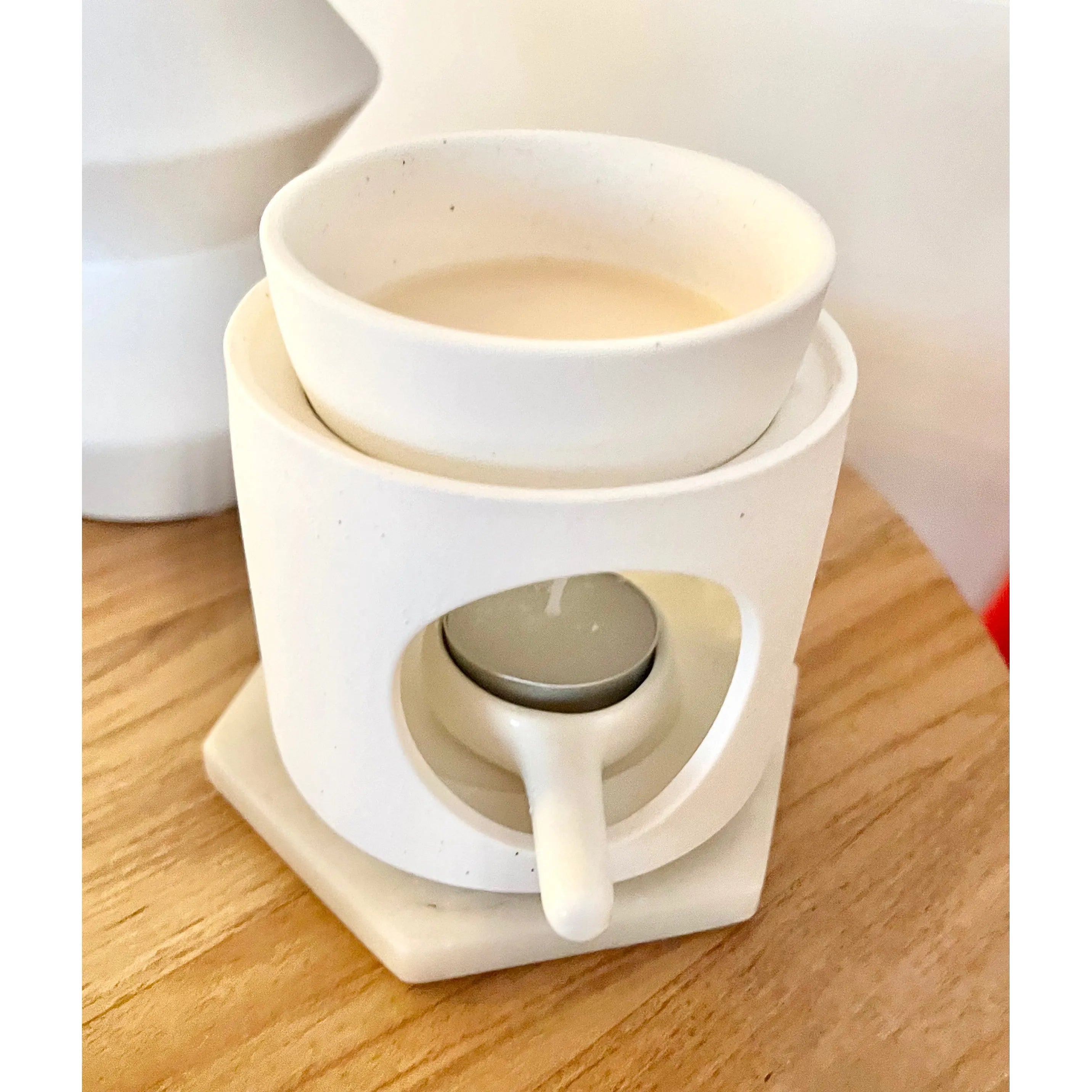 Ceramic wax melter